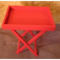A LOVELY VIBRENT RED BUTLERS TRAY ON A STAND