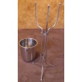 A STYLISH TALL CHAMPAGNE/WINE COOLER ON A STAND