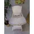 A GORGEOUS VINTAGE BABY HIGH CHAIR THAT CAN CONVER IN A LOW SEAT ASWELL