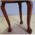 AN ELGANT ROUND SOLID WOOD BALL & CLAW SIDE TABLE