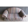 A VERY COMFORTABLE 2 SEATER SOFA FABRIC IS FAIR ONE OR TWO SCUFS - OR FOR RECOVERY