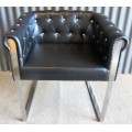 A ELGANT & STYLISH BAKOS BROTHERS STAINLESS STEEL AND FOW LEATHER OCASIONAL CHAIR