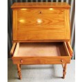 A VERY USEFUL SOLID WOOD WRITING DESK WITH BEAUTIFULL TURNED LEGS