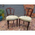 Pair of Victorian Mahogany Dining room chairs with beautiful carved detail