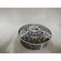 This vintage Imari lidded porcelain box is a lovely item for any traditional home decor and would ma