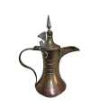 A Turkish / Islamic copper dallah coffee pot