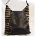 TUMI LEATHER AND HOUNDSTOOTH WOOL BUCKET HANDBAG. QUITE RARE! DUSTCOVER.