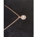 Morganite and diamond pendant in rose gold with chain from Browns.