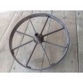 Antique Iron wheelbarrow wheel. Good condition, no rust.