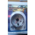 Tachometer with red shift light