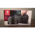 Nintendo Switch complete console (brand new and Factory sealed)