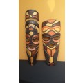Pair of beautiful colourful wooden masks.