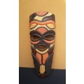 Pair of beautiful colourful wooden masks.