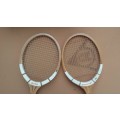 Pair of old wooden Dunlop tennis racquets.