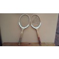Pair of old wooden Dunlop tennis racquets.