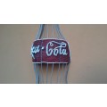 Lovely large wire coca cola.