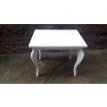 Lovely white side table.