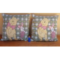 Pair of Pooh & Piglet cushions.