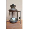 Lovely old metal candle lantern.