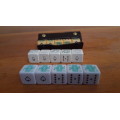 Three sets of old poker dice.