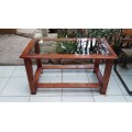 Lovely solid wood and glass coffee table.
