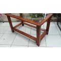 Lovely solid wood and glass coffee table.