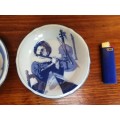 Collection of 3 small Delft wall plates.