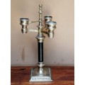 Vintage, solid brass candlestick creation.