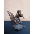 Solid bronze squirrel, sculpture by Sarah Richards.