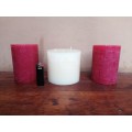Collection of 3 large round candles.
