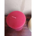 Collection of 3 large round candles.