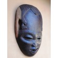 Large hand carved imbuia mask.