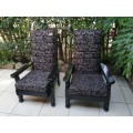 Beautiful pair of black high back arm chairs.