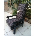 Beautiful pair of black high back arm chairs.