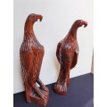 Large pair of solid wood carved eagles.