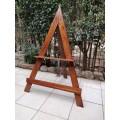 Stunning solid wood sitting easel.