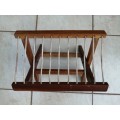 Awesome old solid wood fold up fishing stool.