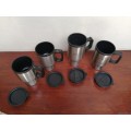 Collection of 4 thermo mugs.