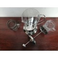 Stainless steel and glass coffee maker.