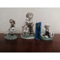 Collection of 3 little ceramic animal lovers ornaments.