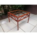 Lovely square cane coffee table.