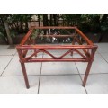 Lovely square cane coffee table.