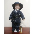 Beautiful English policeman porcelain doll.
