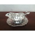 Old silver plated gravy boat.