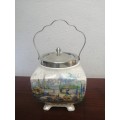 Beautiful antique jar and silver plated lid.