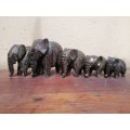 Beautiful carved wooden elephant family.