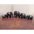 Beautiful carved wooden elephant family.
