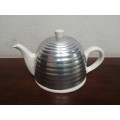 Beautiful white ceramic teapot.