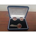 Set of beautiful Komatsu cuff links and tie pin.