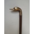 Solid brass duck head walking stick.